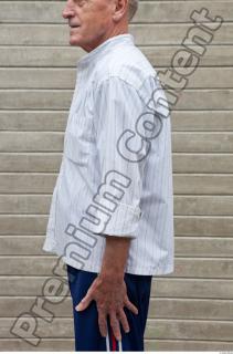 0090 Old white man wrinkless white shirt deep blue jogging…